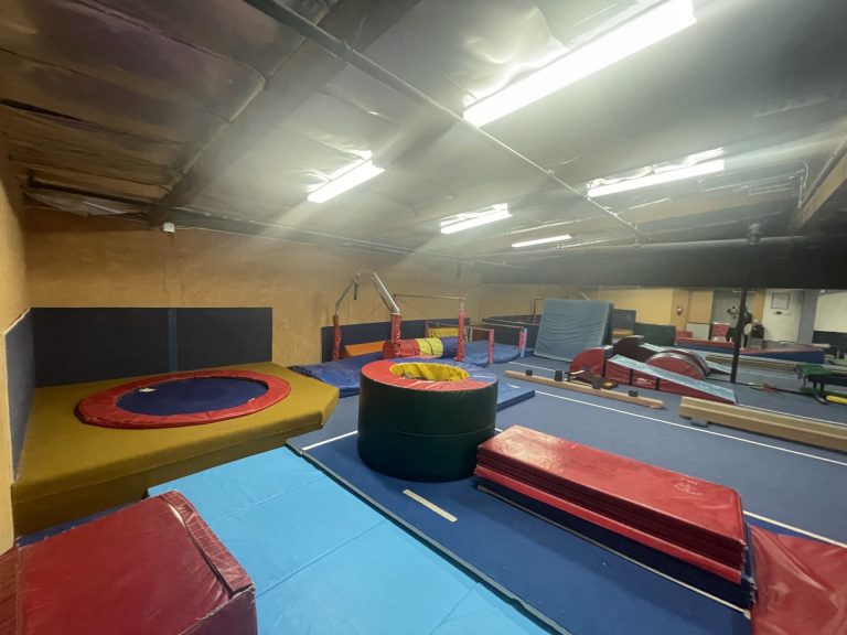 Gymnastics Facility with gymnastics equipment Colorful Mats Mini Gym Area