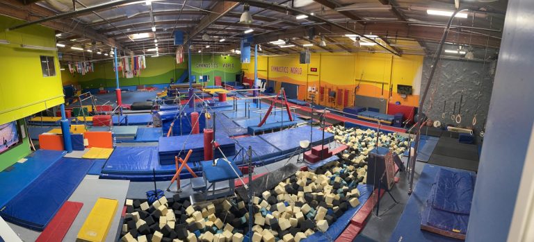 Gymnastics Facility with gymnastics equipment Colorful Mats